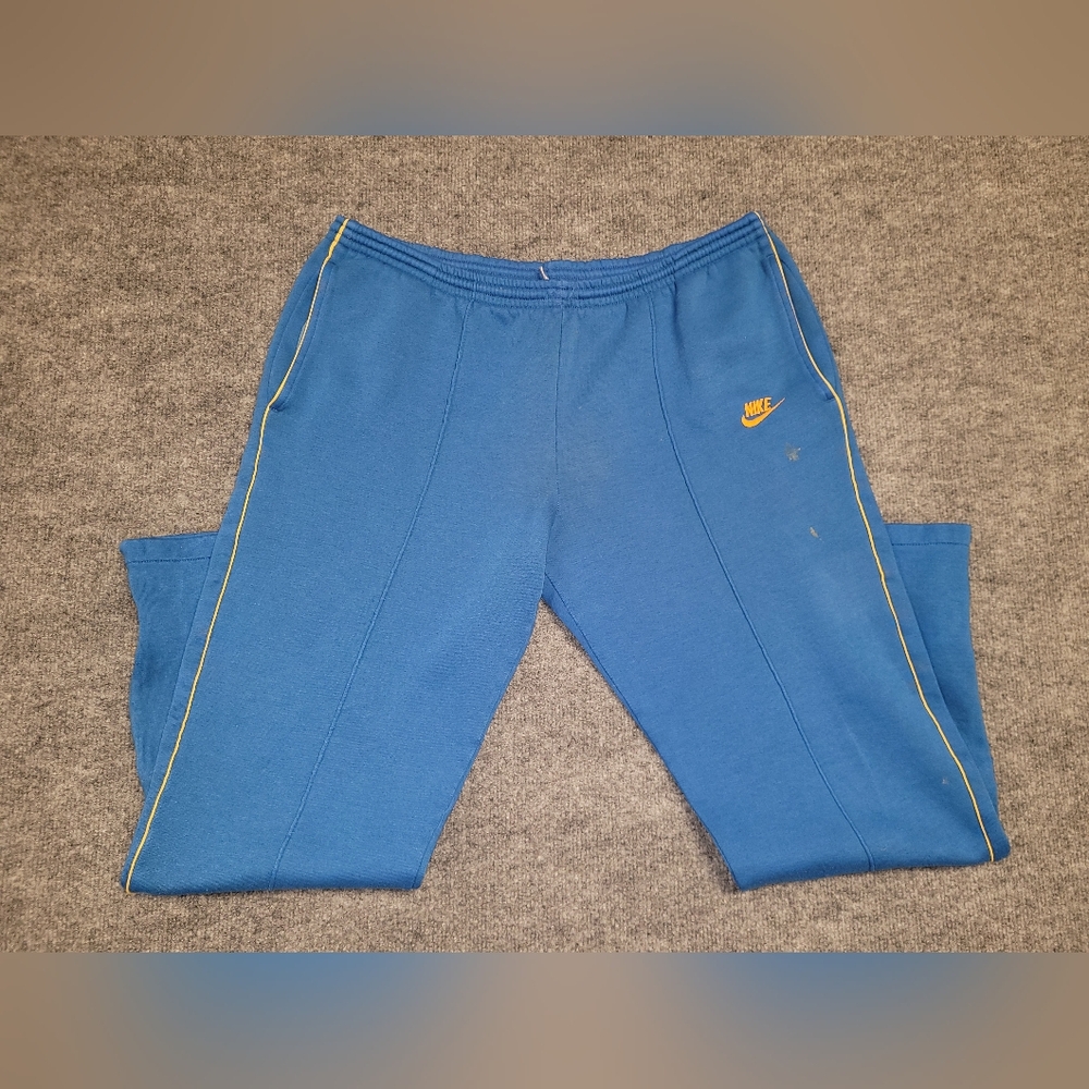 VINTAGE Nike Blue Sweatpants with Yellow Logo